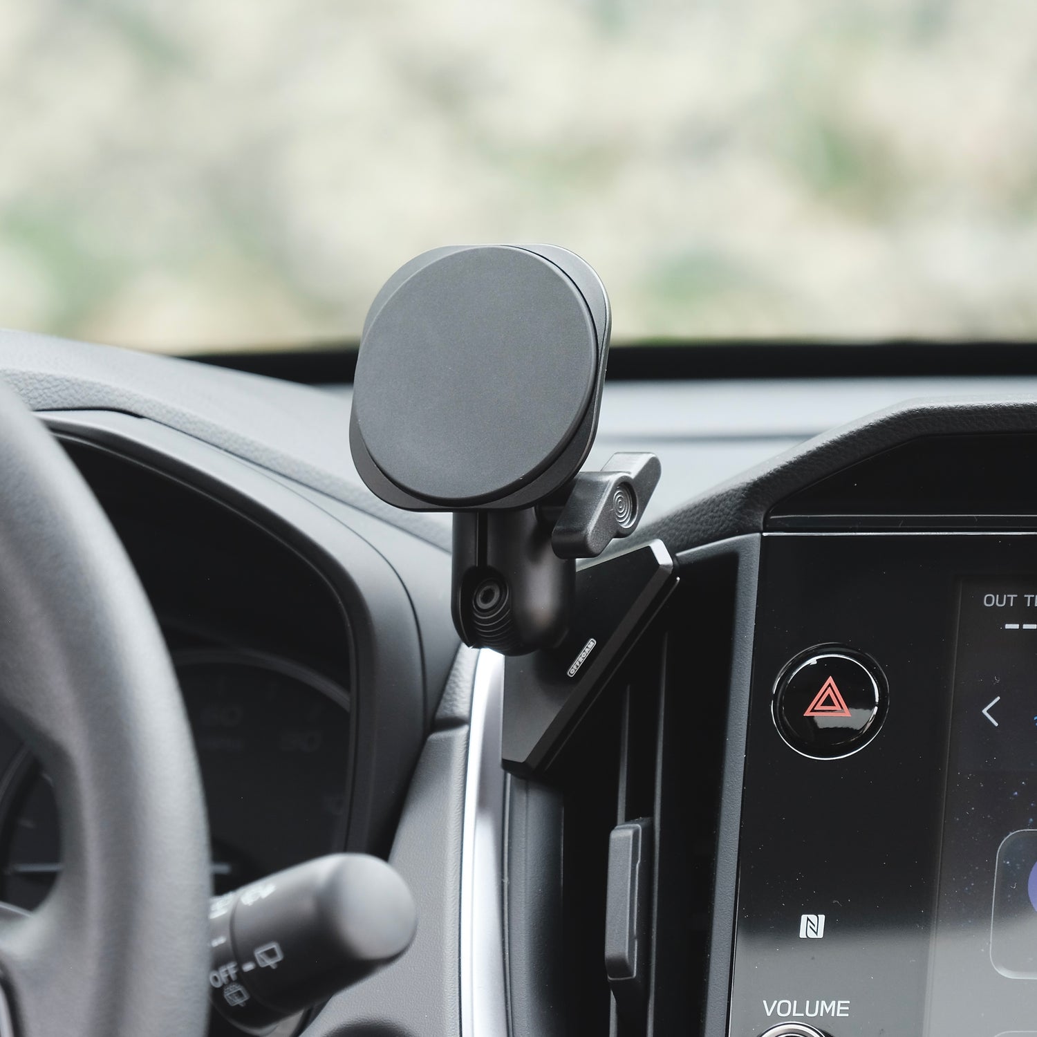 Image of Offroam MagSafe-compatible Phone Mount installed securely in Subaru Crosstrek 2024-2026 | Impreza 2024-2026 | WRX 2022-2026. This premium phone mount installs easily without drilling or glue. High force magnets hold phone on any trail, road, or track. Perfect placement without blocking screens, driver view, or air flow. Fully adjustable positioning.