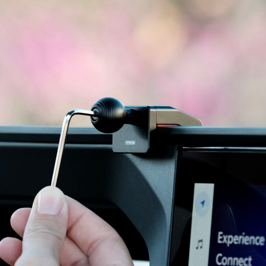 Image of Offroam Mounting Base installed securely in Toyota Land Cruiser 250 2024-2025. This premium all metal phone mounting base installs easily without drilling or glue. Perfect placement without blocking screens, driver view, or air flow.