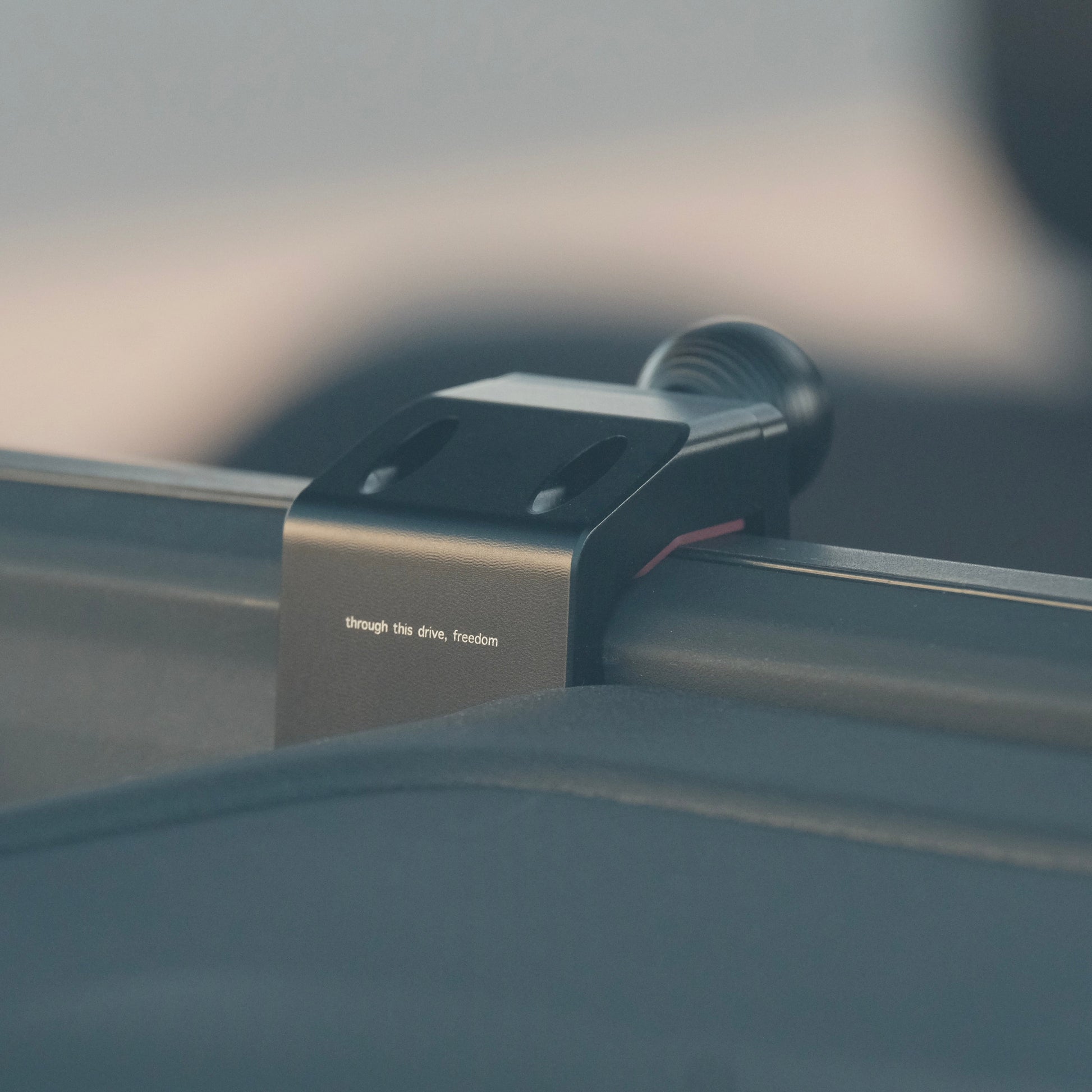 Image of Offroam Mounting Base installed securely in Toyota Land Cruiser 250 2024-2025. This premium all metal phone mounting base installs easily without drilling or glue. Perfect placement without blocking screens, driver view, or air flow.