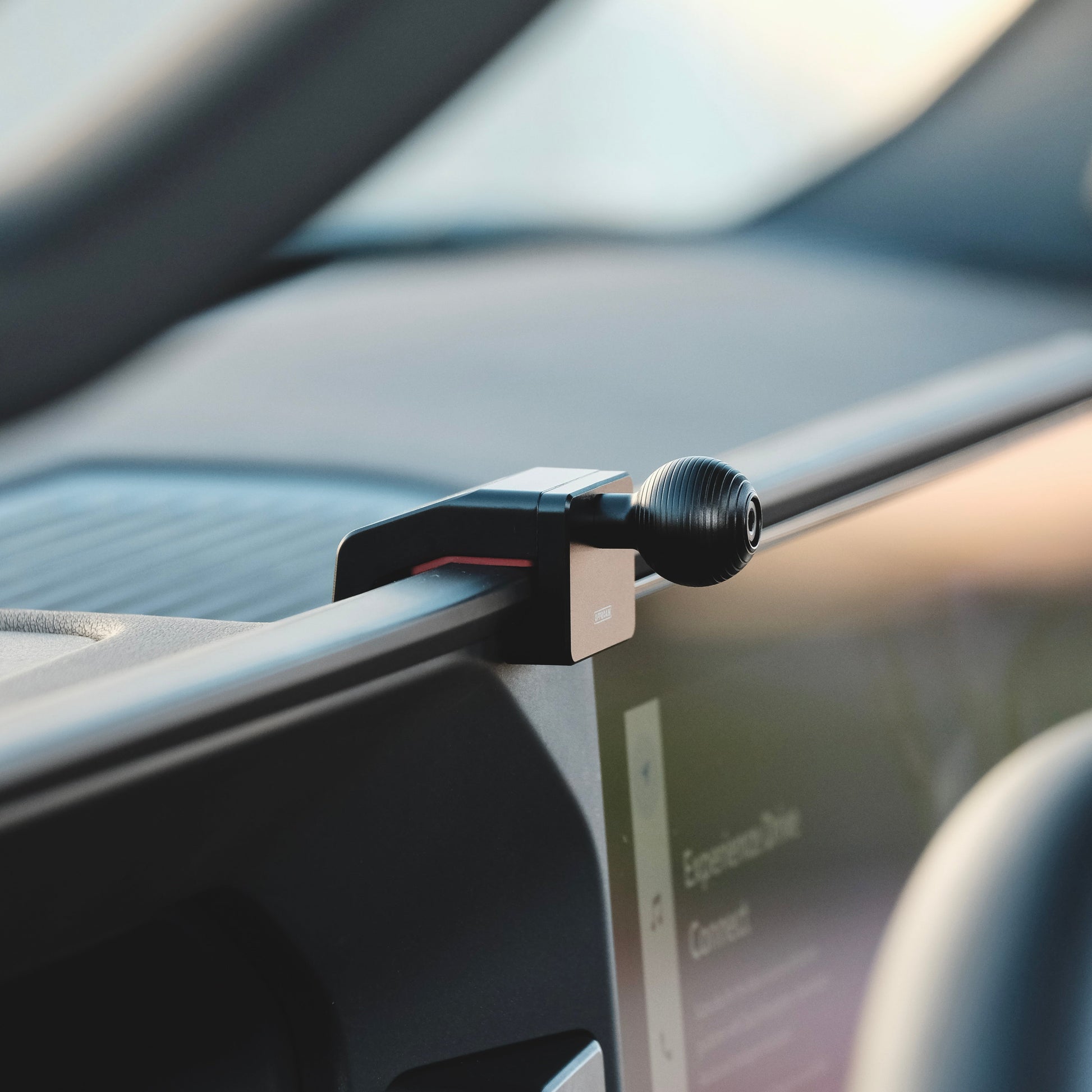 Image of Offroam Mounting Base installed securely in Toyota Land Cruiser 250 2024-2025. This premium all metal phone mounting base installs easily without drilling or glue. Perfect placement without blocking screens, driver view, or air flow.