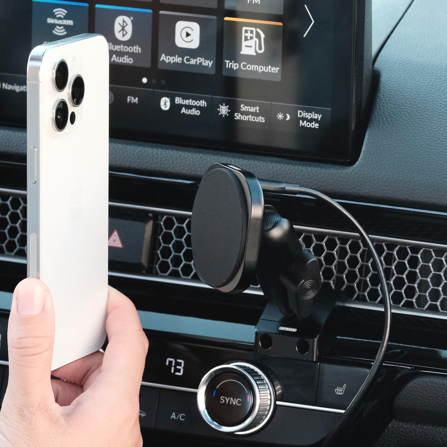 Image of Offroam MagSafe-compatible Phone Mount installed securely in Honda Civic 2022-2026 | CR-V 2023-2026. This premium phone mount installs easily without drilling or glue. High force magnets hold phone on any trail, road, or track. Perfect placement without blocking screens, driver view, or air flow. Fully adjustable positioning.