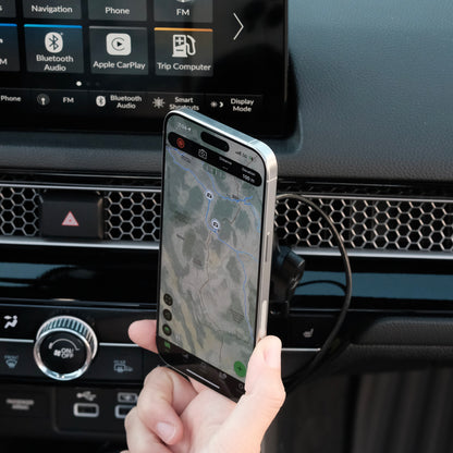 Image of Offroam MagSafe-compatible Phone Mount installed securely in Honda Civic 2022-2026 | CR-V 2023-2026. This premium phone mount installs easily without drilling or glue. High force magnets hold phone on any trail, road, or track. Perfect placement without blocking screens, driver view, or air flow. Fully adjustable positioning.