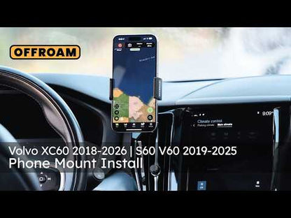 Video of Offroam Universal and MagSafe-compatible Phone Mount installation for Volvo XC60 2018-2026. This premium phone mount installs easily without drilling or glue. Spring loaded Universal holder or MagSafe-compatible holder with high force magnets hold phone on any trail, road, or track. Perfect placement without blocking screens, driver view, or air flow. Fully adjustable positioning.