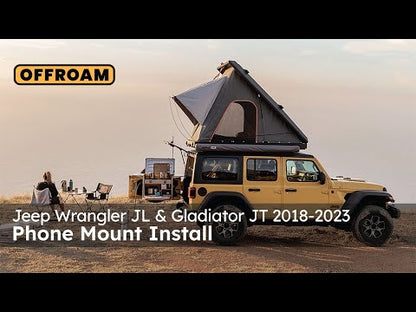 Video of Offroam Phone Mount installation for Jeep Wrangler 2018-2023 | Gladiator 2019-2023. This premium phone mount installs easily without drilling or glue. Spring loaded Universal holder for use with any phone. Perfect placement without blocking screens, driver view, or air flow. Fully adjustable positioning.