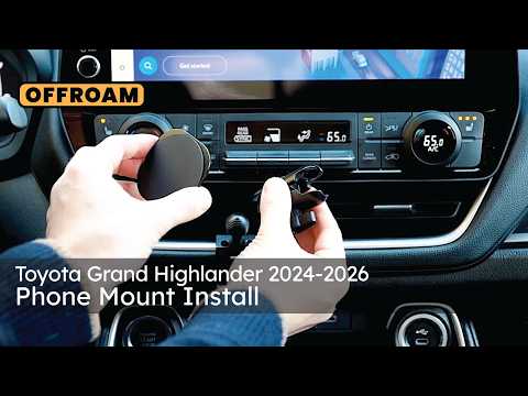 Video of Offroam Phone Mount installation for Toyota Grand Highlander 2024-2026. This premium phone mount installs easily without drilling or glue. Spring loaded Universal holder for use with any phone. Perfect placement without blocking screens, driver view, or air flow. Fully adjustable positioning.
