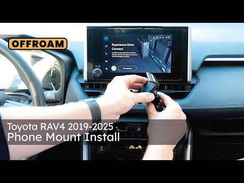 Video of Offroam Universal and MagSafe-compatible Phone Mount installation for Make Toyota RAV4 2019-2025. This premium phone mount installs easily without drilling or glue. Spring loaded Universal holder or MagSafe-compatible holder with high force magnets hold phone on any trail, road, or track. Perfect placement without blocking screens, driver view, or air flow. Fully adjustable positioning.